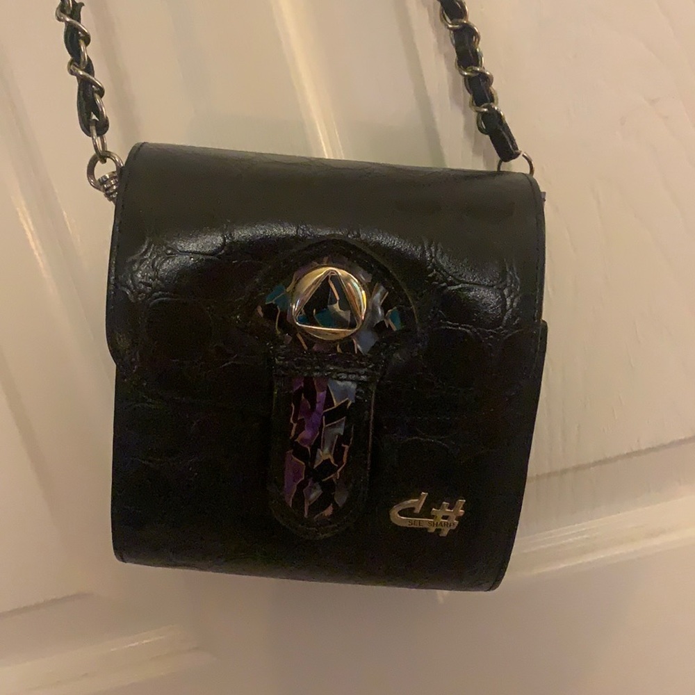 Vintage purse with button closure